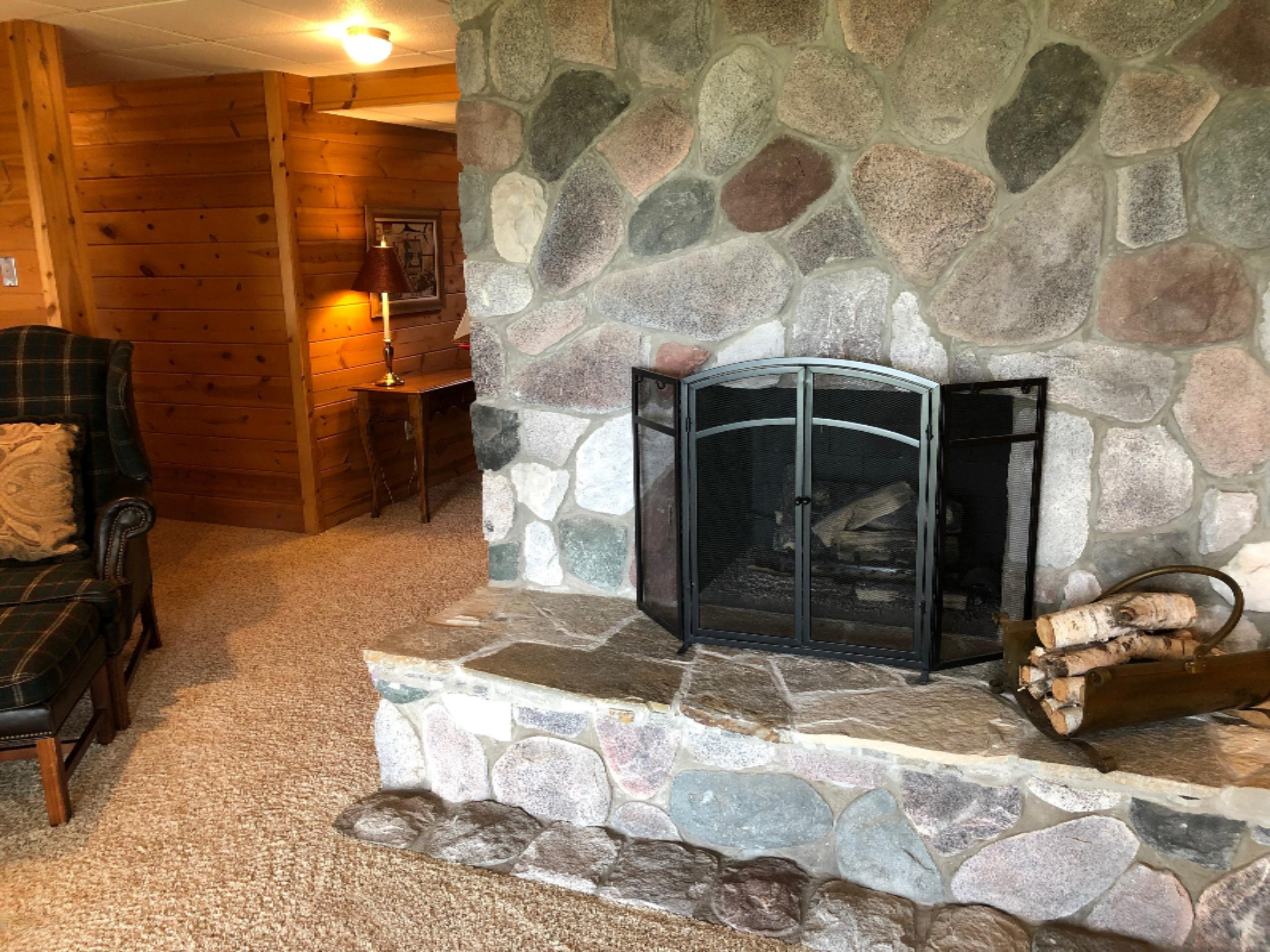 2536 Crescent Beach Road Manistee, MI 49660 - Photo 29 of 55 Stone Natl Gas Fireplace in Lower Level