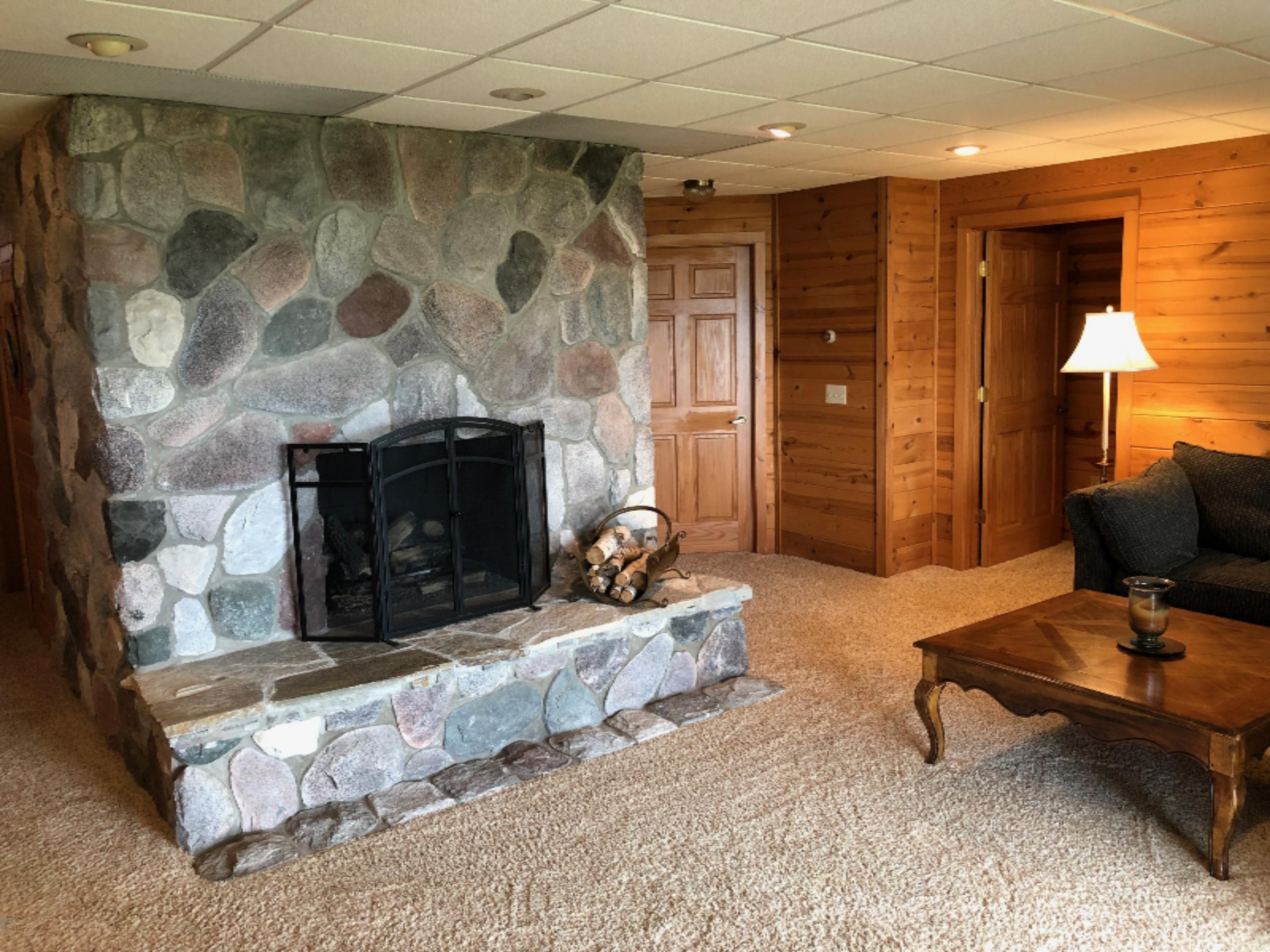 2536 Crescent Beach Road Manistee, MI 49660 - Photo 30 of 55 Lower Level and Open Door to Bedroom