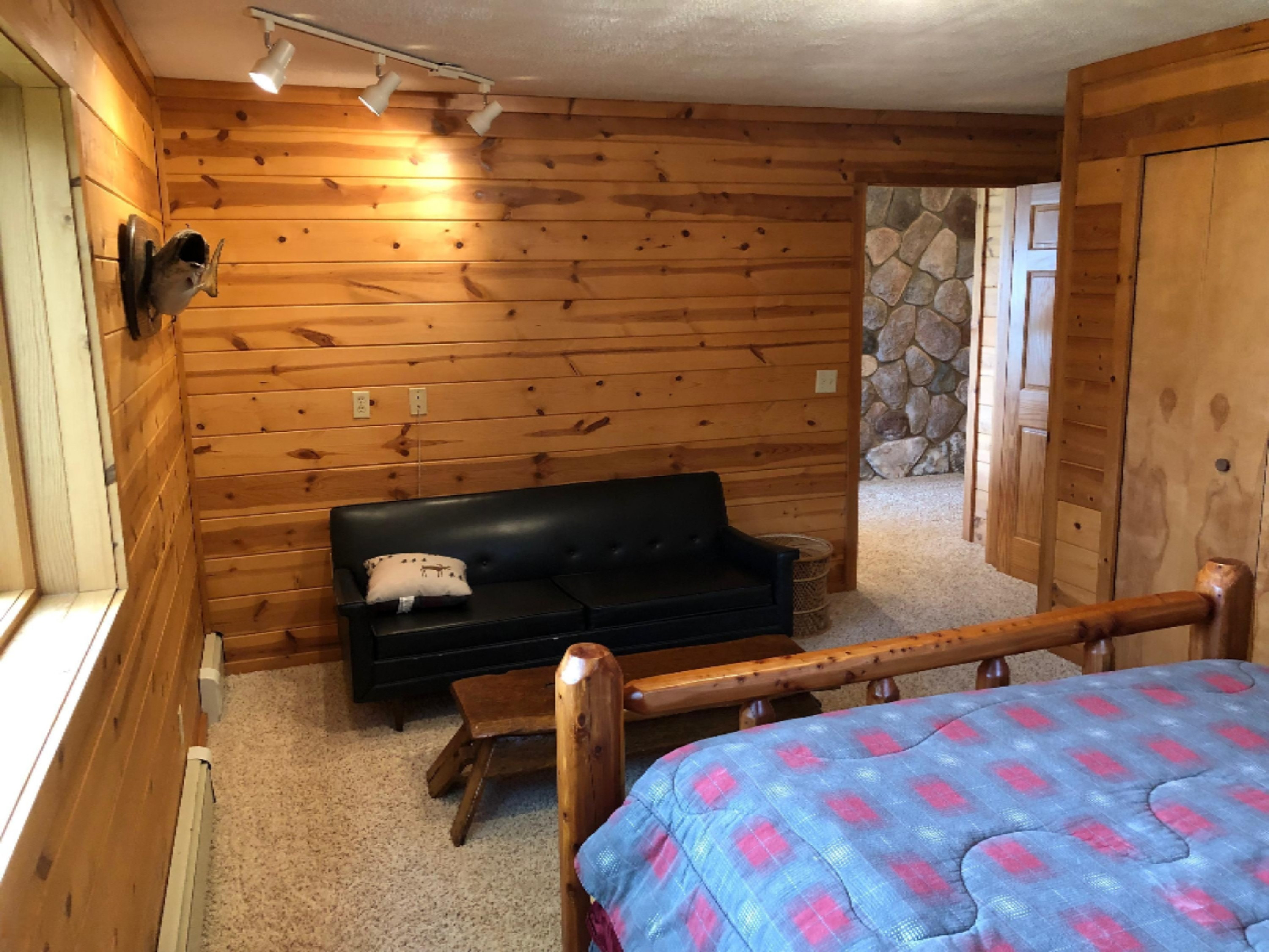 2536 Crescent Beach Road Manistee, MI 49660 - Photo 35 of 55 Lower Level BR has room for a couch!