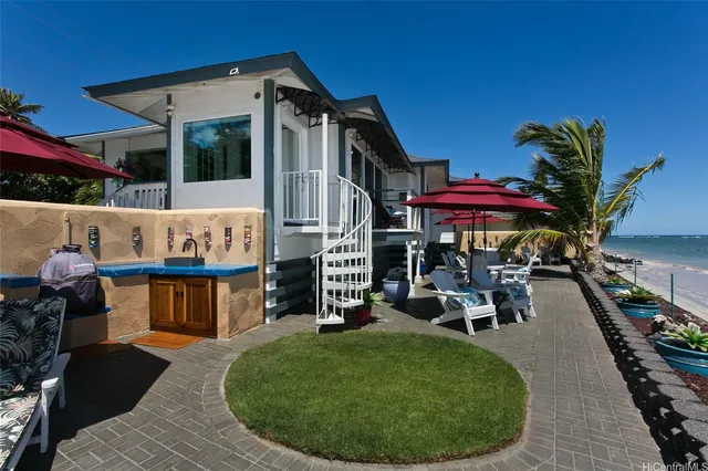 a view of a chairs and tables in patio