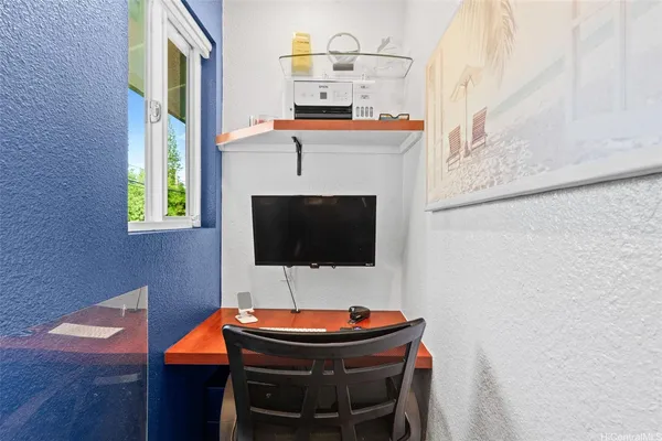 a bathroom with a toilet a sink and a mirror