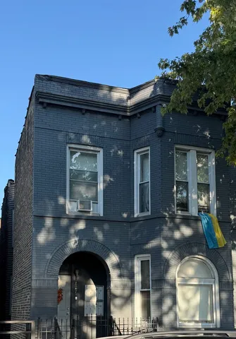 a front view of a house with balcony