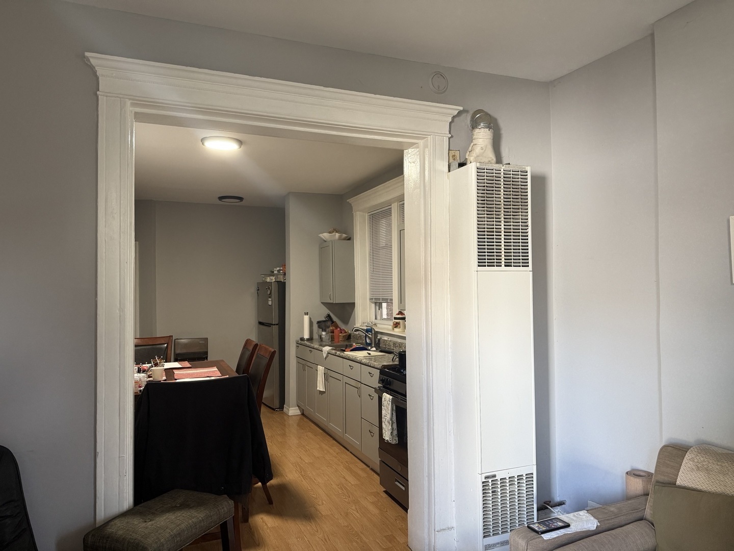 827 North Fairfield Avenue Chicago, IL 60622 - Photo 14 of 55 a kitchen with a refrigerator and a stove