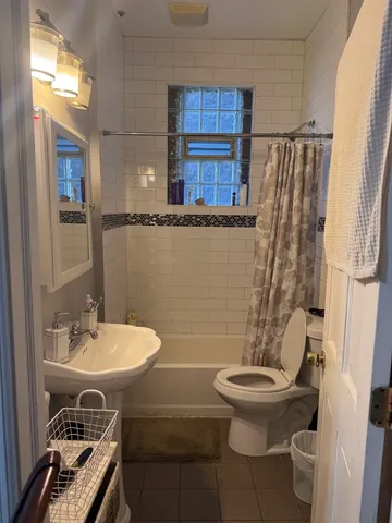 a bathroom with a sink and a bathtub
