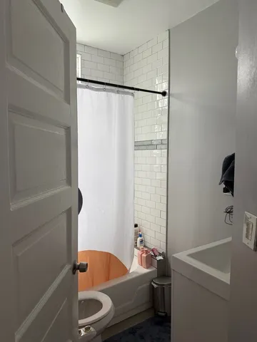 a room with furniture and a window