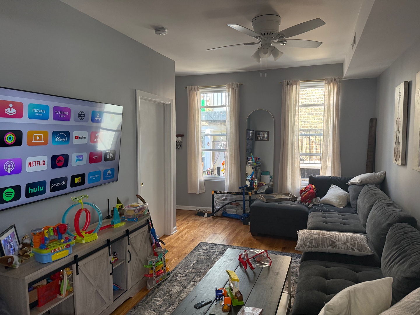 827 North Fairfield Avenue Chicago, IL 60622 - Photo 23 of 55 a living room with lots of furniture and a window