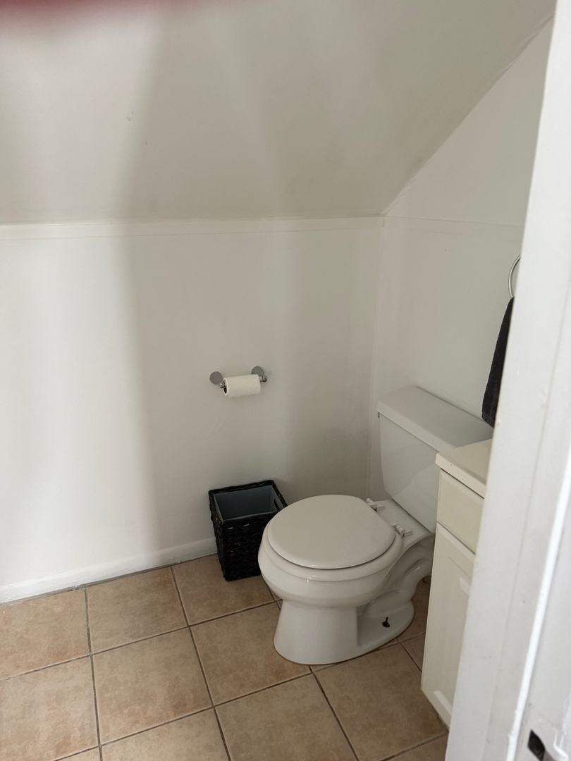 827 North Fairfield Avenue Chicago, IL 60622 - Photo 30 of 55 a white toilet sitting next to a white wall
