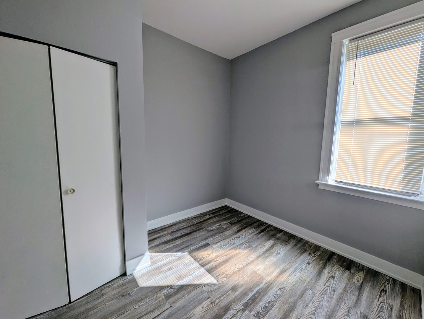 827 North Fairfield Avenue Chicago, IL 60622 - Photo 42 of 55 a view of empty room with wooden floor and fan