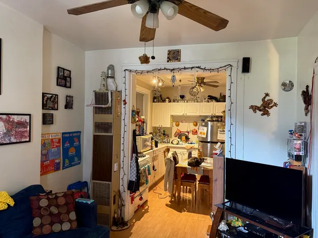 a room with furniture and a flat screen tv