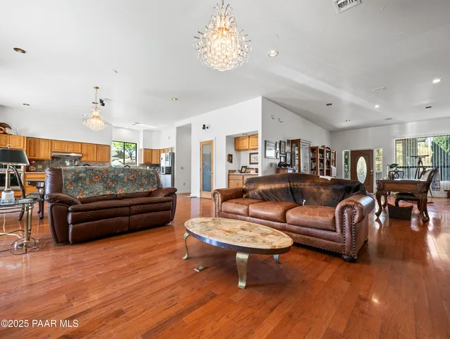 a kitchen with stainless steel appliances granite countertop a stove and a sink
