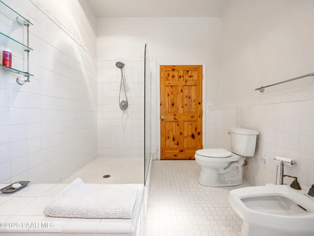 a bathroom with a toilet and a sink