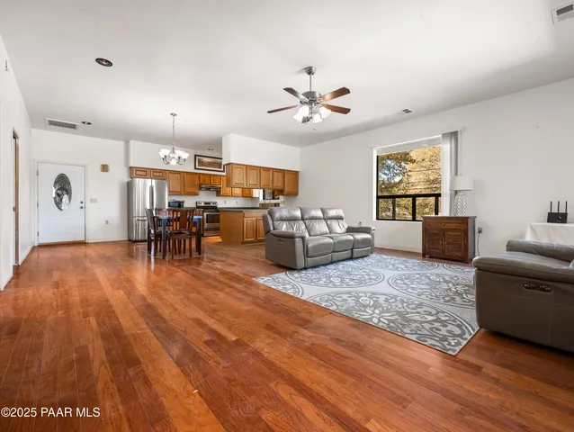 a living room with furniture and a couch