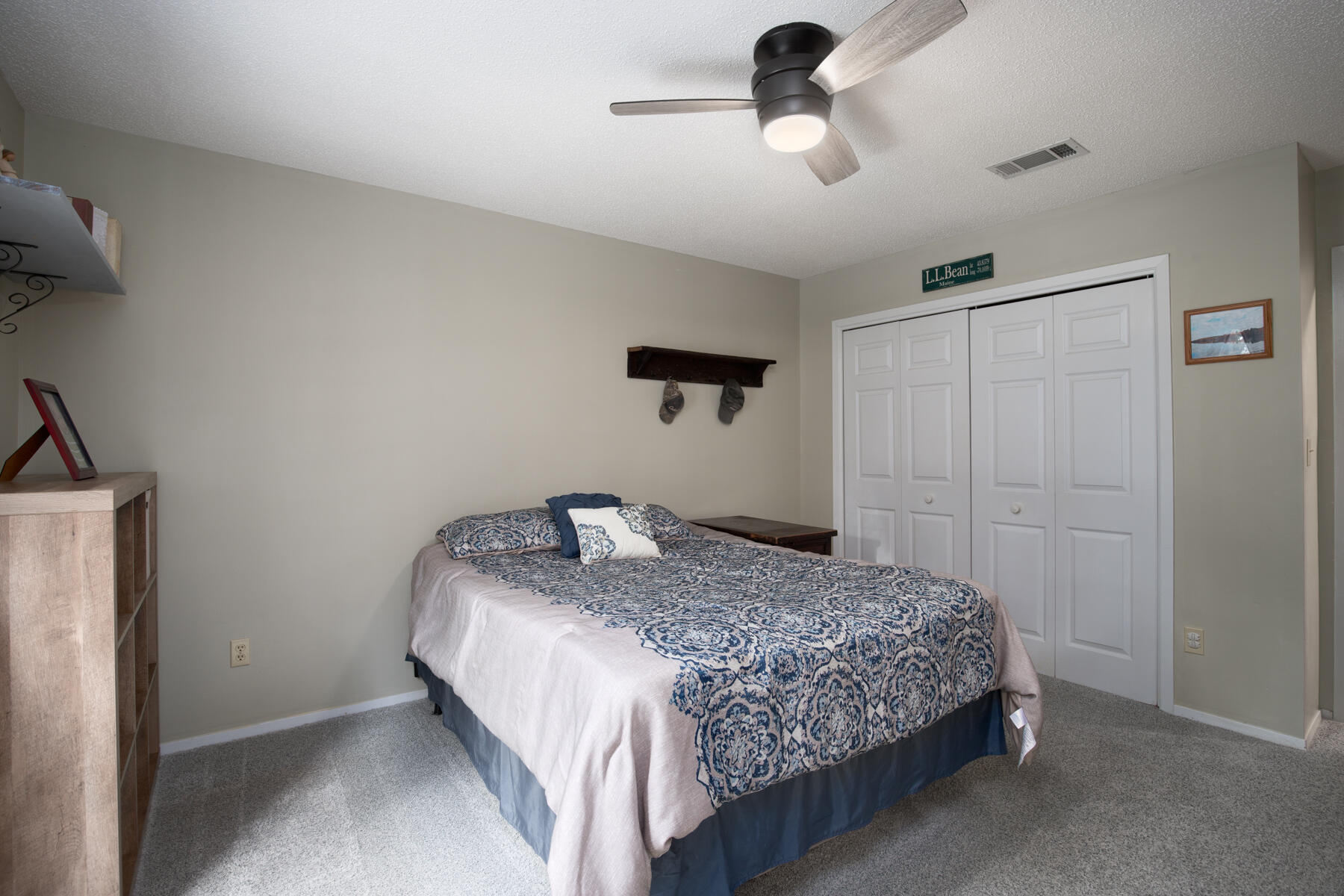 2826 Penney Lane Crestview, FL 32539 - Photo 12 of 22 a bedroom with a bed and ceiling fan