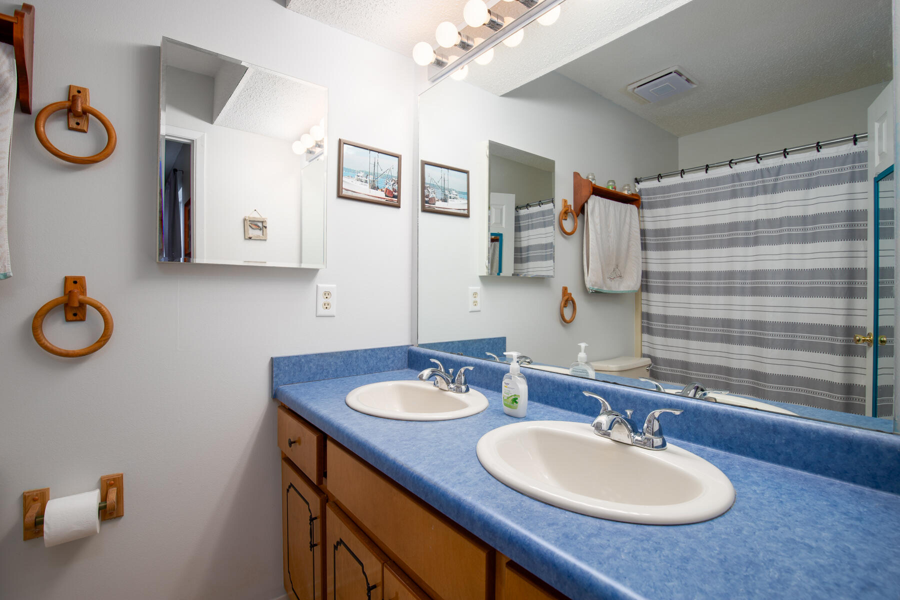 2826 Penney Lane Crestview, FL 32539 - Photo 14 of 22 a bathroom with a sink and a mirror