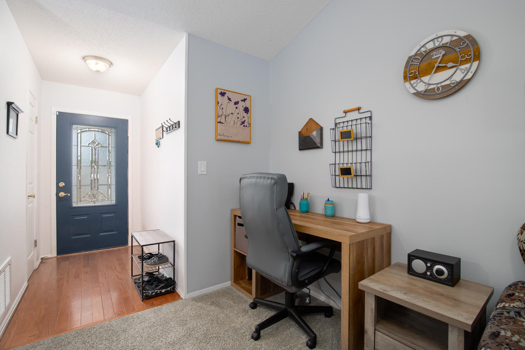 2826 Penney Lane Crestview, FL 32539 - Photo 7 of 22 a workspace with furniture and wooden floor