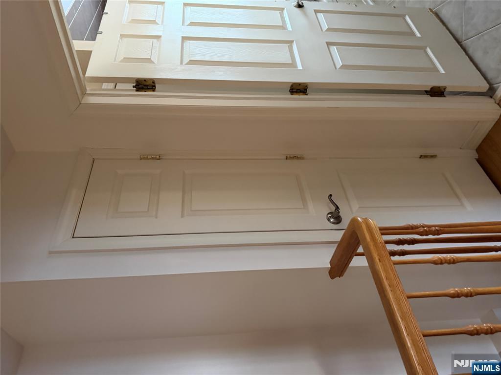 37 Park Row, Unit 2 Wallington, NJ 07057 - Photo 14 of 33 a view of a hallway with wooden floor