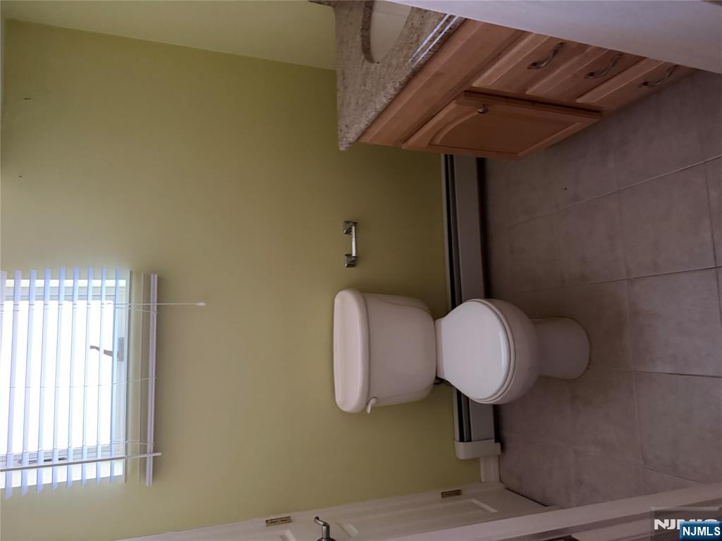 37 Park Row, Unit 2 Wallington, NJ 07057 - Photo 25 of 33 a bathroom with a toilet