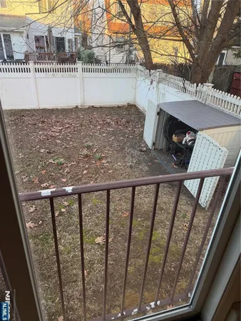 a view of balcony and a yard