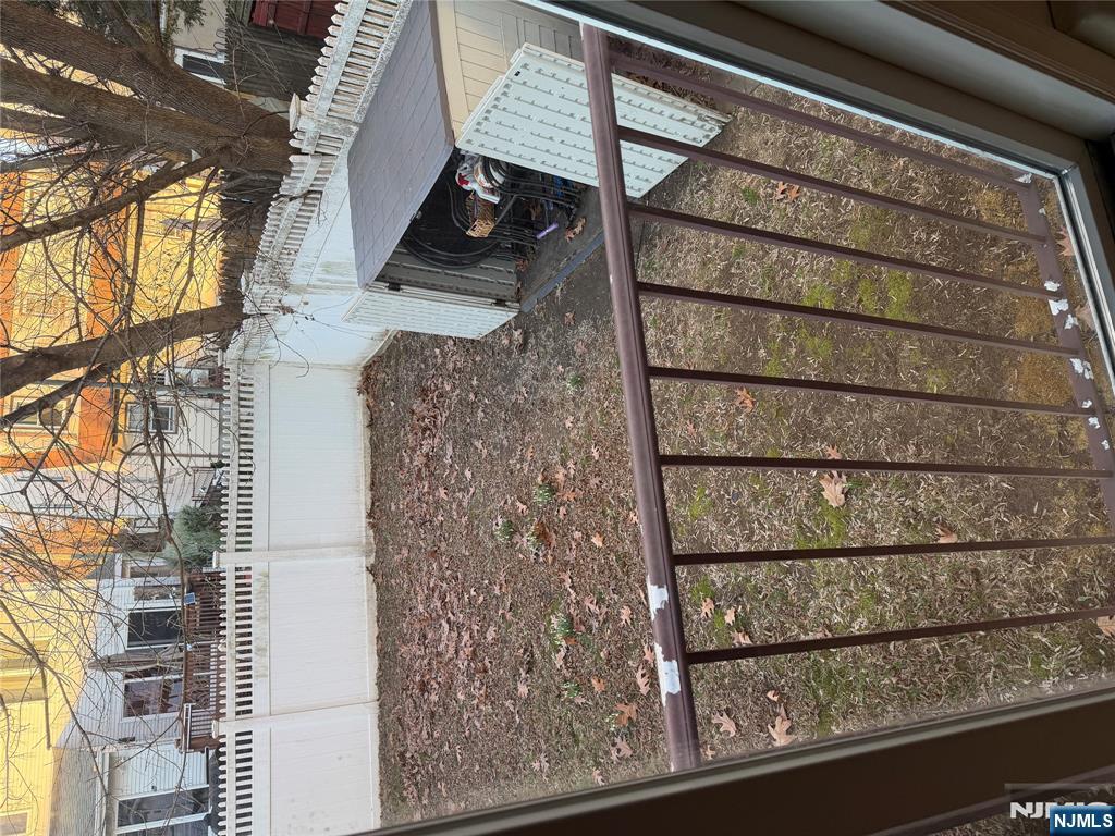 37 Park Row, Unit 2 Wallington, NJ 07057 - Photo 27 of 33 a view of balcony with wooden fence
