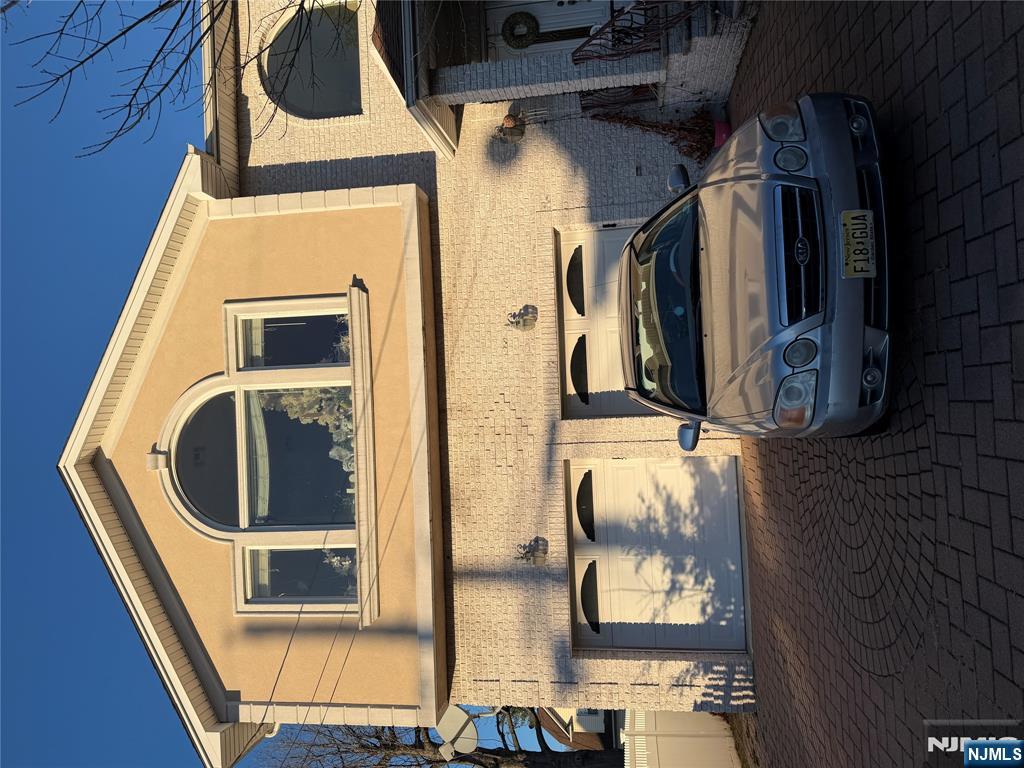 37 Park Row, Unit 2 Wallington, NJ 07057 - Photo 3 of 33 a car parked in front of a house