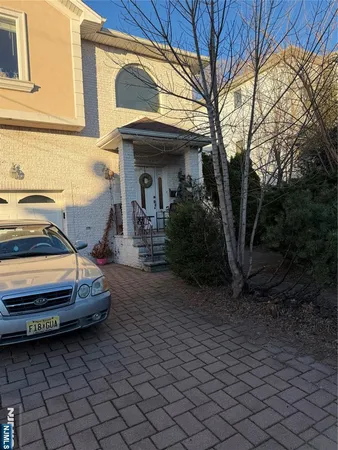 a car parked in front of a house
