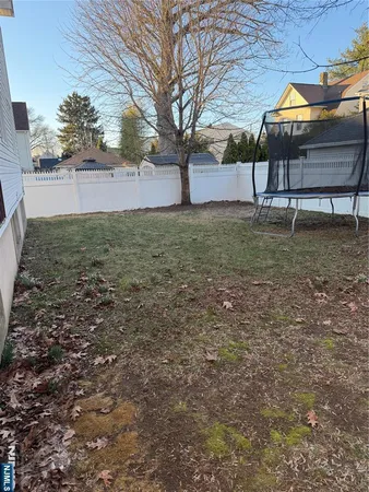 a view of backyard with green space