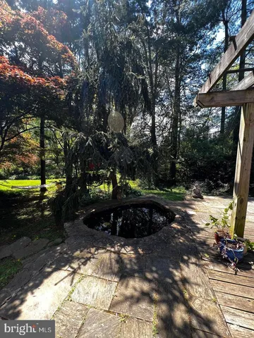 a view of a golf course with a tree