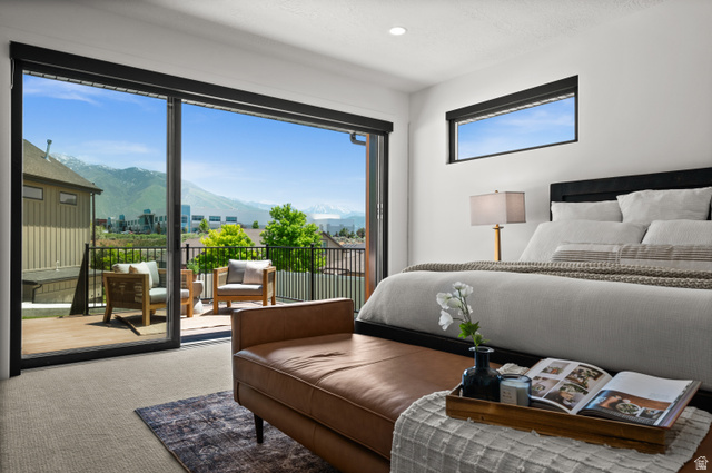 507 West Windmill Gate Cove Draper, UT 84020 - Photo 22 of 46 Bedroom featuring a mountain view, carpet flooring, and access to exterior