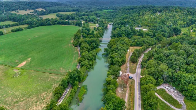 a view of a golf course with a lake