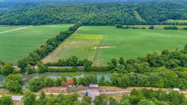 a view of a lake with a yard