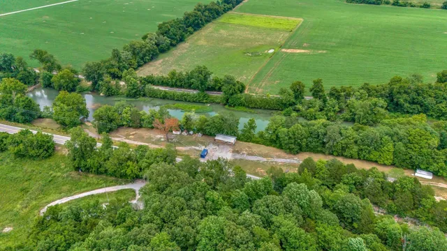 a view of a garden with a building