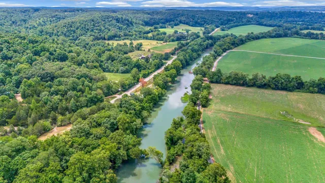 a view of a lake view with a garden