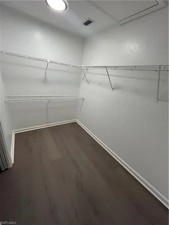 a view of a room with racks on the wall