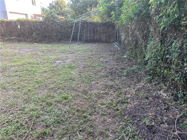 a view of backyard with green space
