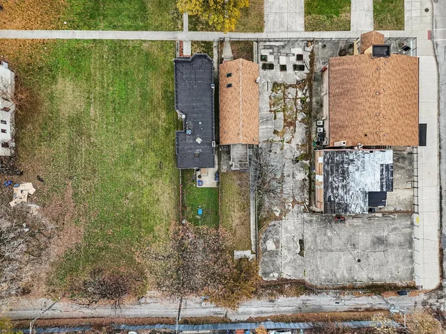 an aerial view of residential building and lake view