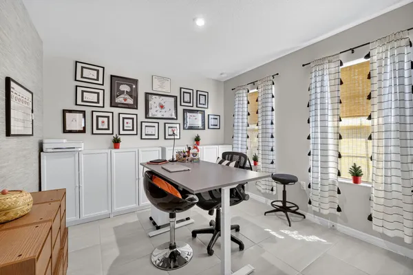 a view of a livingroom with furniture and window