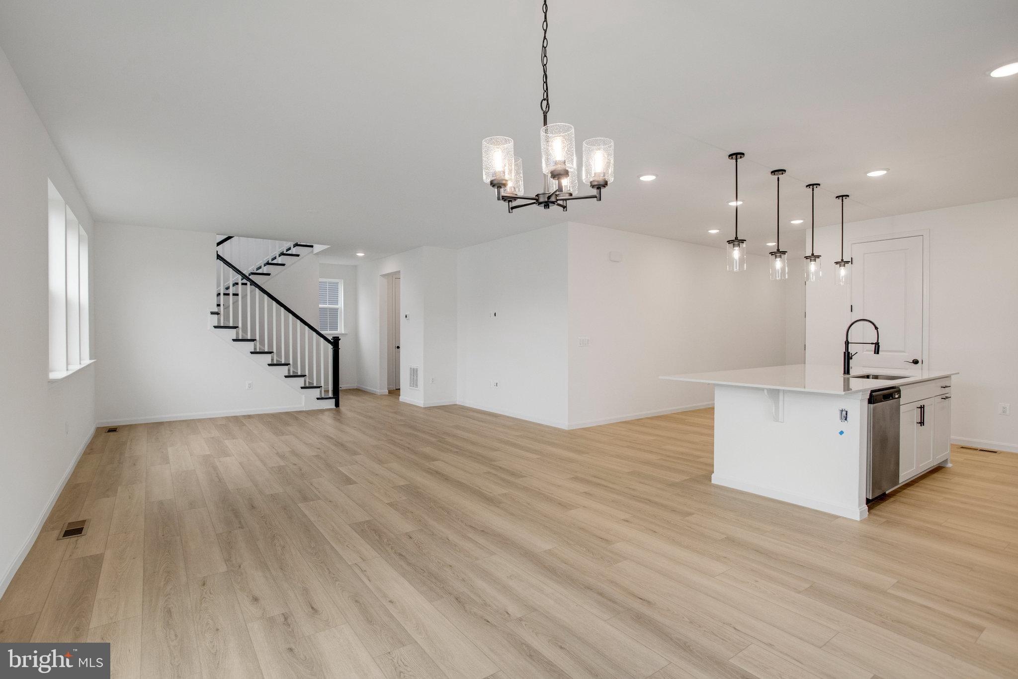 2005 Divot Drive Culpeper, VA 22701 - Photo 13 of 46 a view of a kitchen with wooden floor and a sink