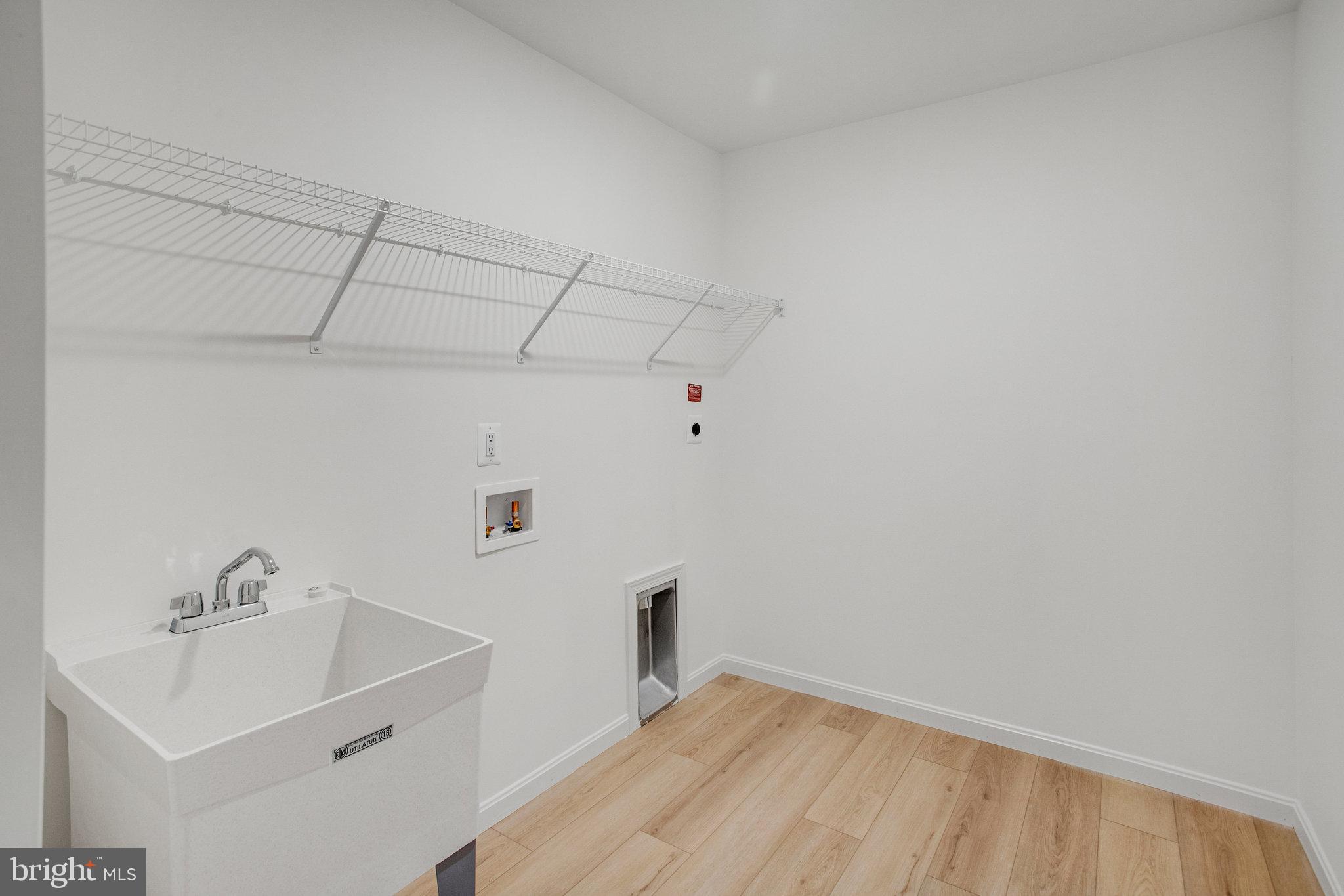 2005 Divot Drive Culpeper, VA 22701 - Photo 33 of 46 a view of a sink and utility room with closet