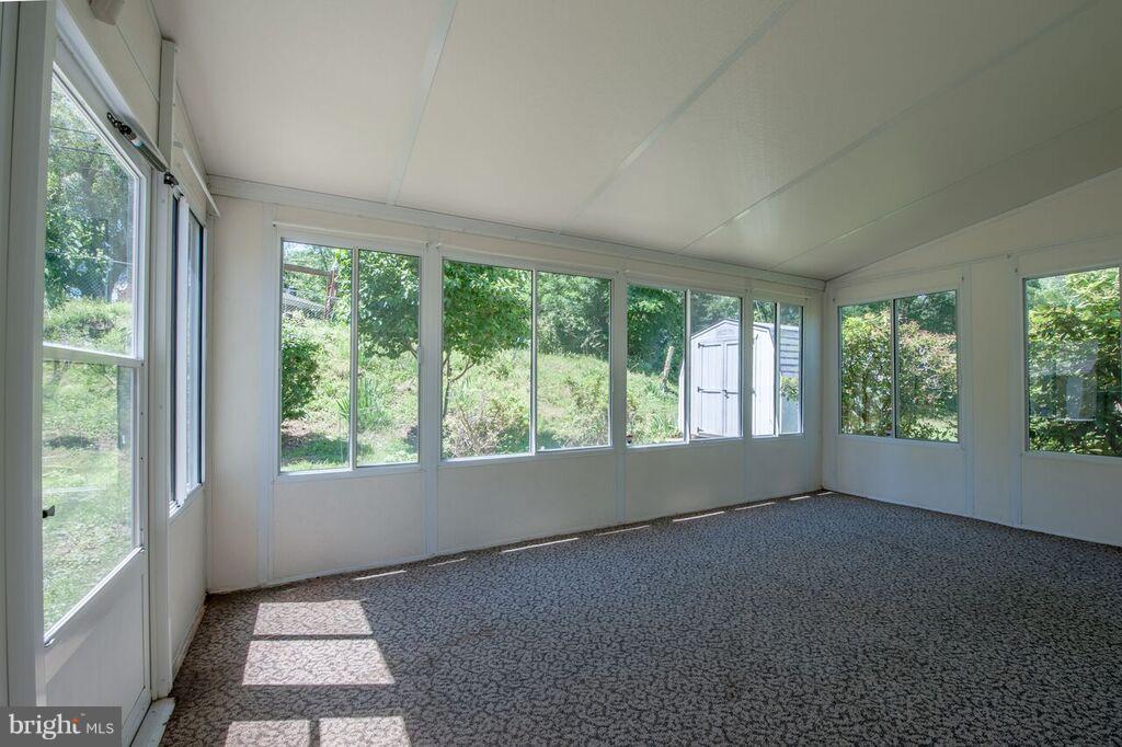 3824 Offutt Road Randallstown, MD 21133 - Photo 26 of 27 a view of an empty room with a window