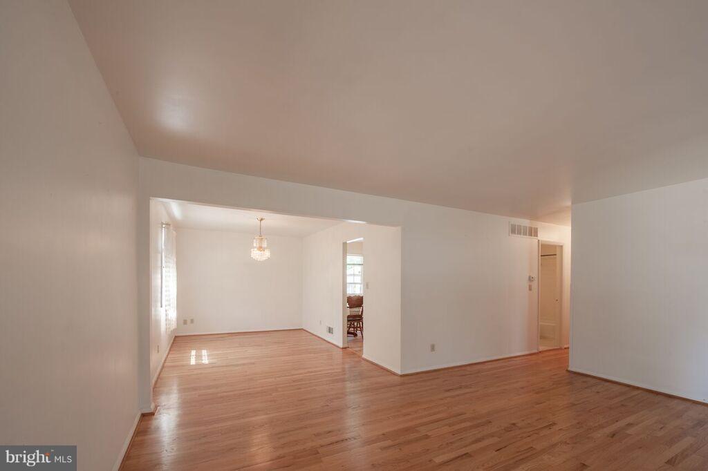 3824 Offutt Road Randallstown, MD 21133 - Photo 8 of 27 a view of empty room with wooden floor