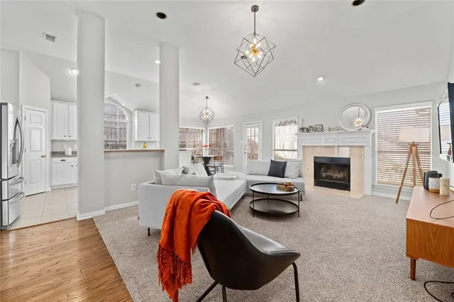 a view of a livingroom with furniture and a fireplace