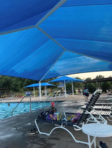 a view of a chairs and tables in patio