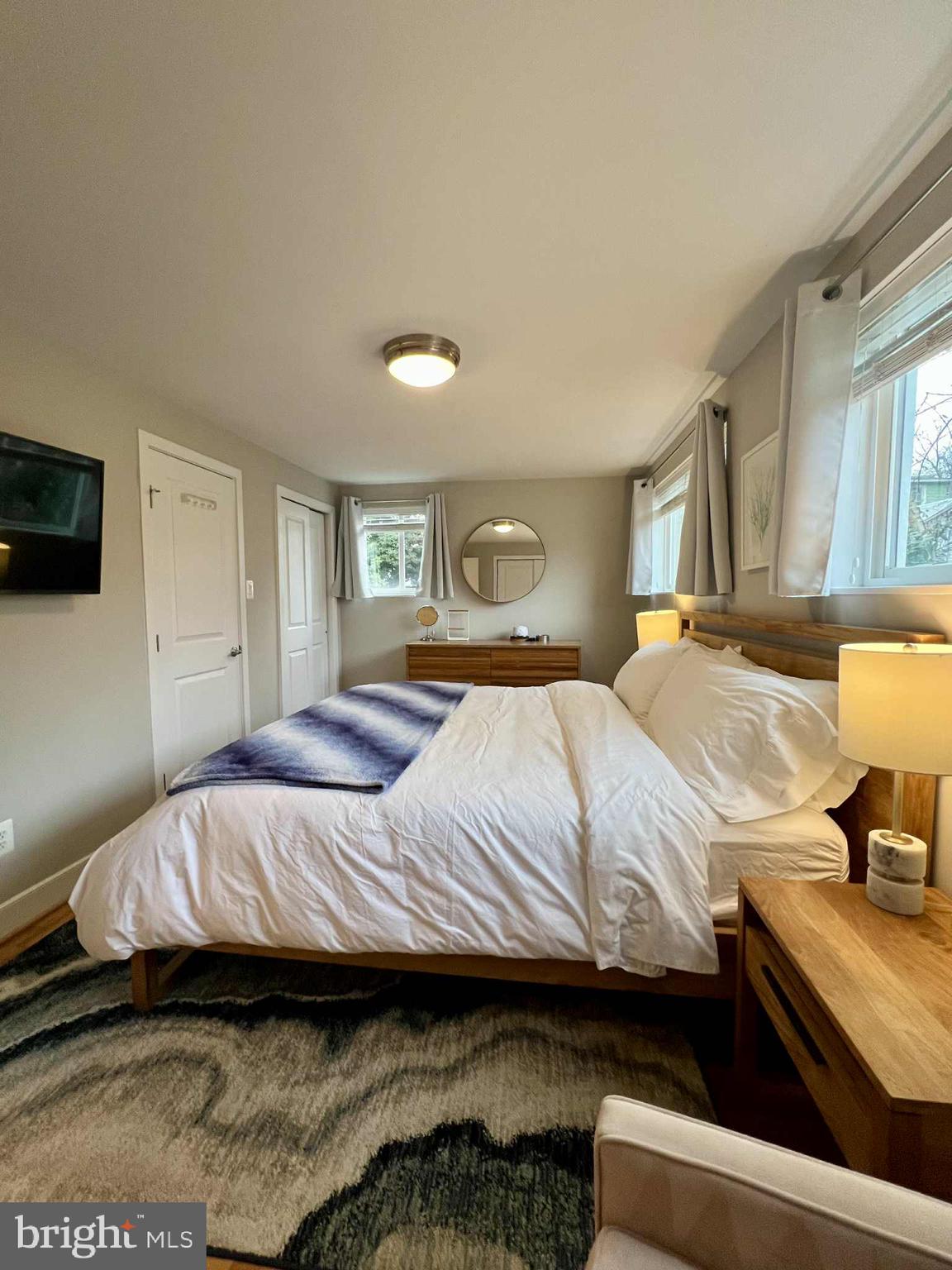 4118 18th Road North Arlington, VA 22207 - Photo 11 of 48 a bedroom with a bed and a television