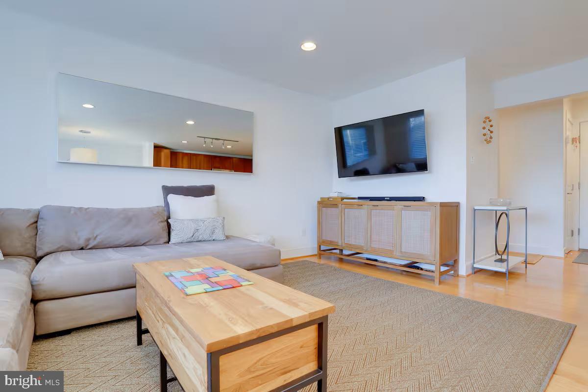 4118 18th Road North Arlington, VA 22207 - Photo 20 of 48 a living room with a flat screen tv and a couch