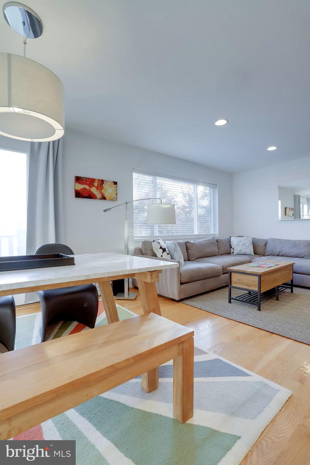 4118 18th Road North Arlington, VA 22207 - Photo 22 of 48 a living room with furniture and a table