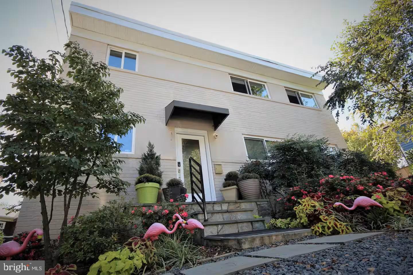 4118 18th Road North Arlington, VA 22207 - Photo 47 of 48 a front view of house with yard and outdoor seating