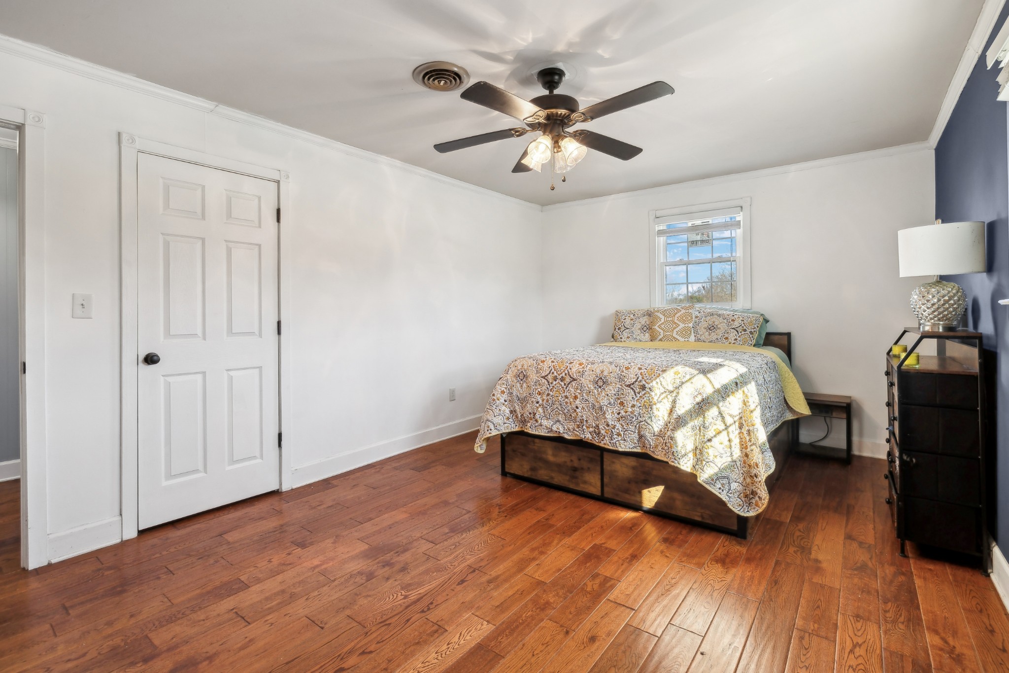 950 Roberts Road Clarksville, TN 37040 - Photo 14 of 35 a bedroom with a bed and a chandelier
