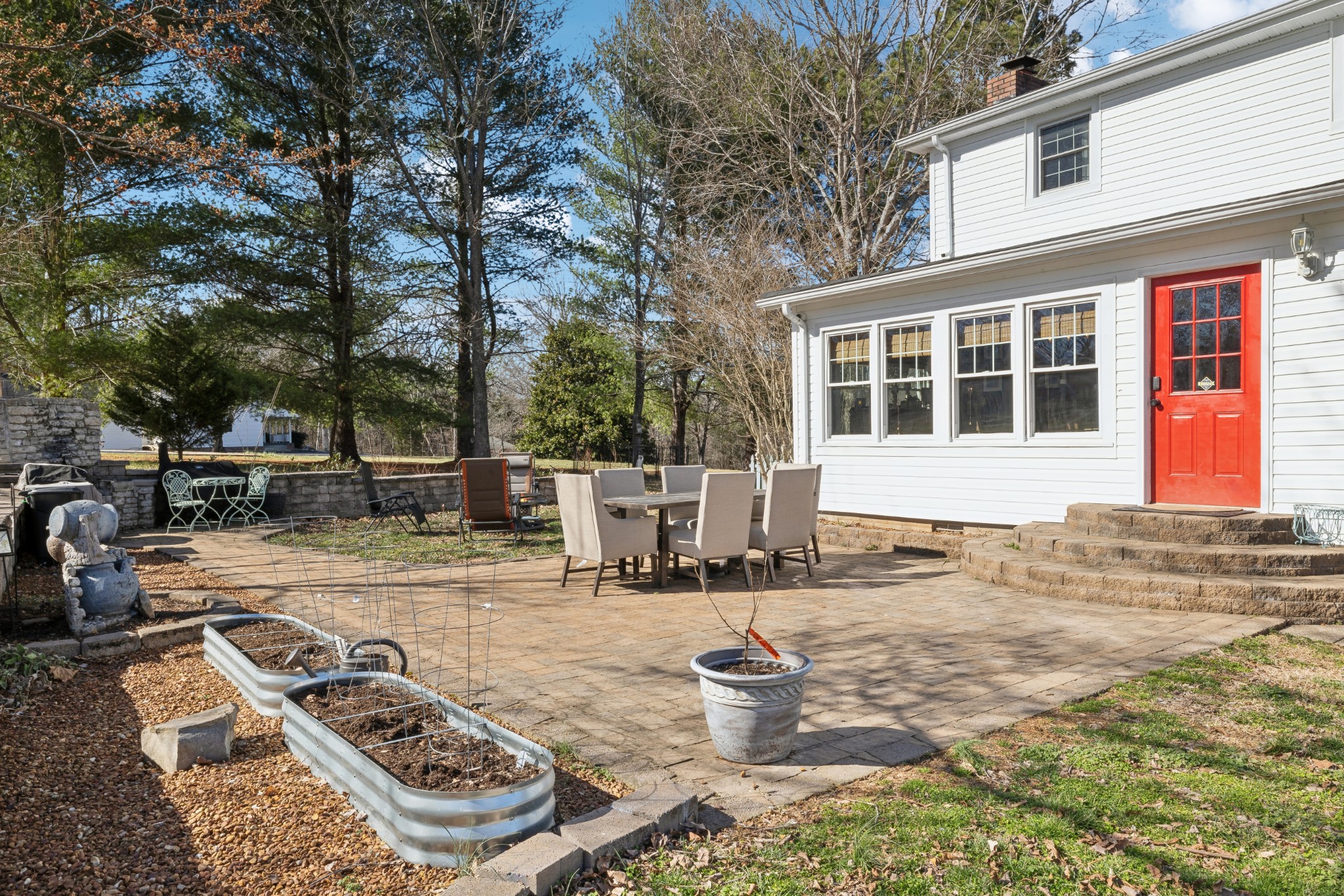 950 Roberts Road Clarksville, TN 37040 - Photo 5 of 35 a view of a backyard with table and chairs