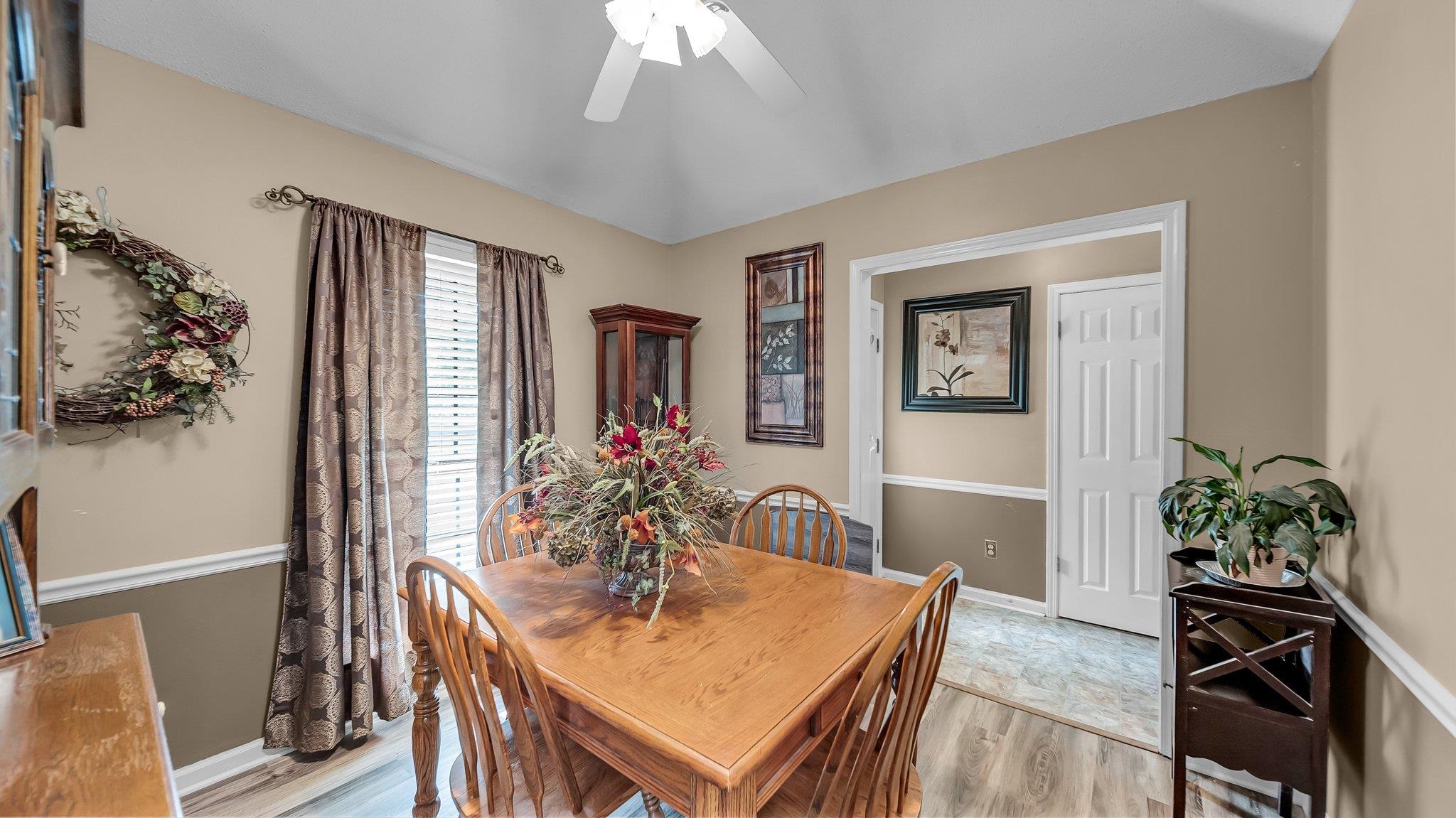6488 Chase Road Millington, TN 38053 - Photo 10 of 22 Dining area with baseboards, light wood-type flooring, and a ceiling fan