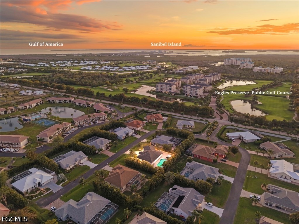 13570 Harbour Ridge Drive Fort Myers, FL 33908 - Photo 45 of 50 an aerial view of residential houses with city view